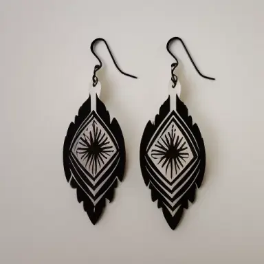 lasercutted wooden loosestrife earrings, only wood, black and white